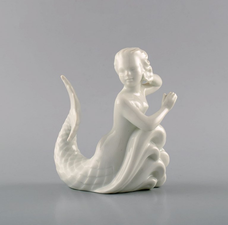 Harald Salomon for Rörstrand, blanc de chine / white-glazed figure depicting 
mermaid.