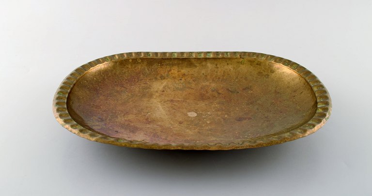 Lars Holmstrøm for Arvika, Sweden. Art deco brass bowl on ball feet. 1950