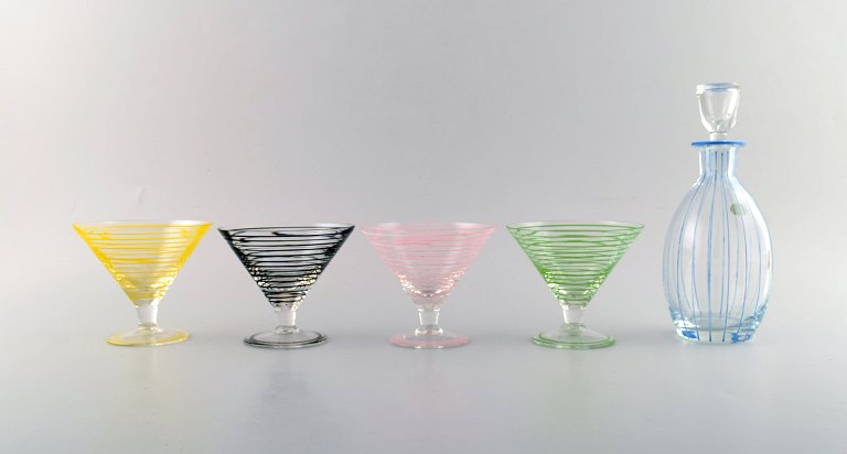 Åfors glasbruk, Sweden. A set of 4 cocktail glasses and decanter in hand-painted 
mouth blown artificial glass. 1960.