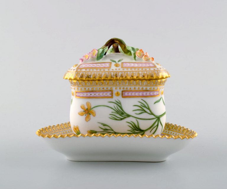 Royal Copenhagen Flora Danica triangular cream cup. Dessin # 20/3575 with branch 
shaped handle and flowers.