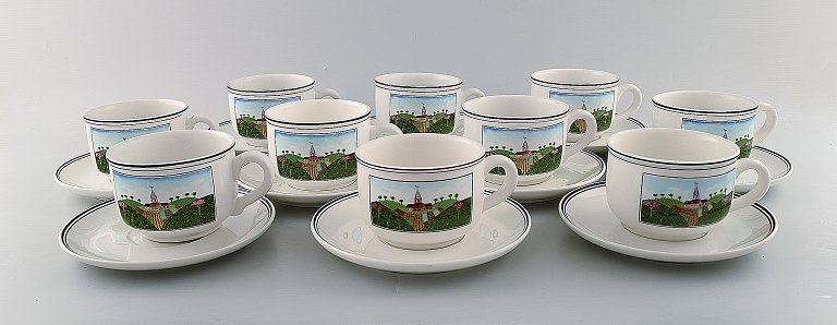 Villeroy & Boch Naif coffee service in porcelain. A set of 10 large cups with 
saucers decorated with naivist village motif.