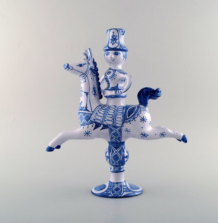 Bjorn Wiinblad figurine from the blue house.
Figure / candlestick rider on horseback with space for a light.