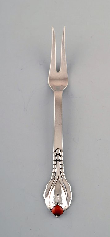 Evald Nielsen number 3, meat fork in hammered sterling silver with cabochon 
coral bead. 1920