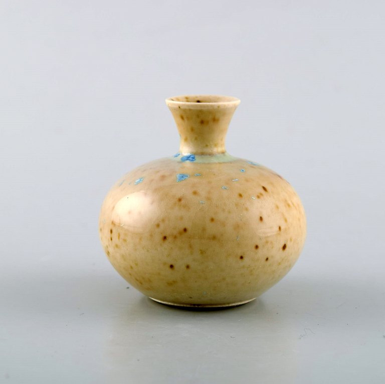 Gustavsberg Studio Hand. Miniature vase. Beautiful glaze in bright earth shades 
with turquoise touch. Ca. 1980.