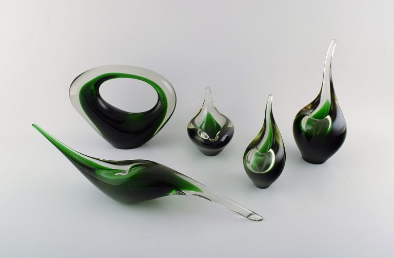 Per Lütken for Holmegaard. Collection of five rare "Flamingo" vases and 
sculptures in green art glass. Danish design, dated 1961.