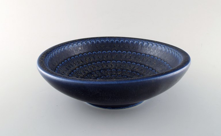 Wilhelm Kåge (1889-1960) for Gustavsberg.
Large Bowl of stoneware, decorated with brown and blueish glaze.