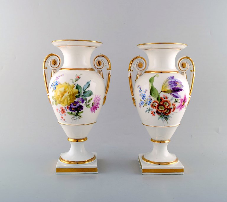 A pair of Meissen empire vases with hand painted flower decoration. Ca.1900. 1st 
factory quality.