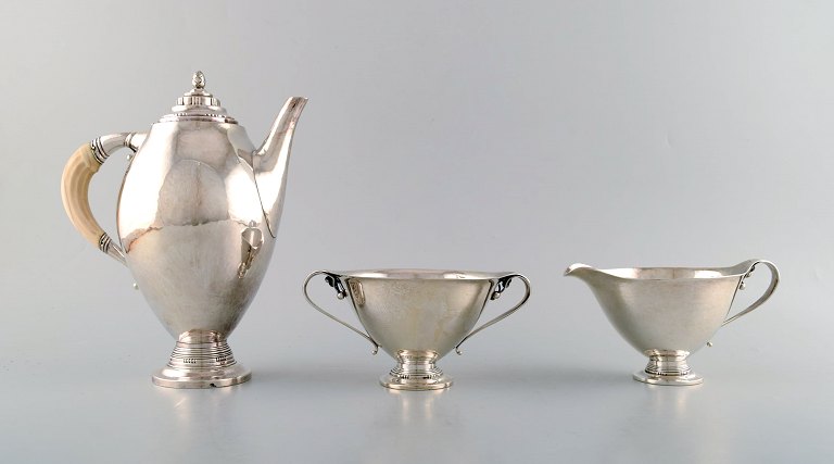 Johan Rohde for Georg Jensen. Rare and early Coffee service in sterling silver. 
Dated 1919.