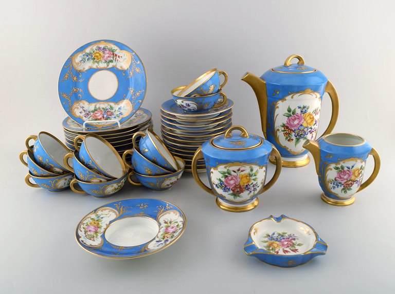 Sevres, Paris. Antique tea service in hand painted porcelain. Decoration in gold 
leaf. Complete for twelve people. 1890-1910.