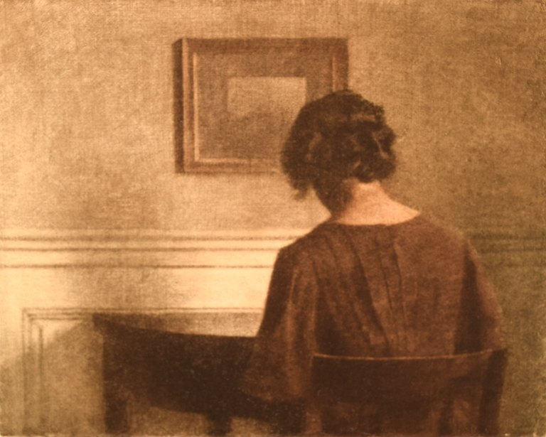 Peter Ilsted (1861-1933). Interior with woman. Color etching.
Ca. 1900.