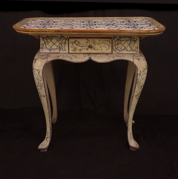 An 18th century tile top table. Denmark circa 1760. H: 77cm. Top: 60x86cm