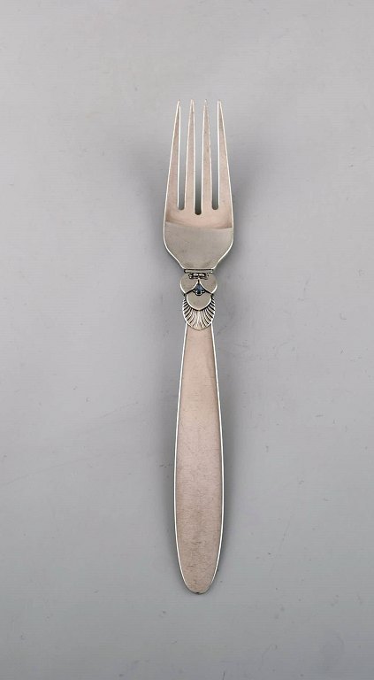 Early Georg Jensen "Cactus" dinner fork in sterling silver. Dated 1915-30. Eight 
pieces in stock.