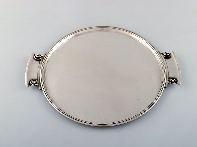 Round "Grape" tray with handles in art nouveau style. Model Number 296.
