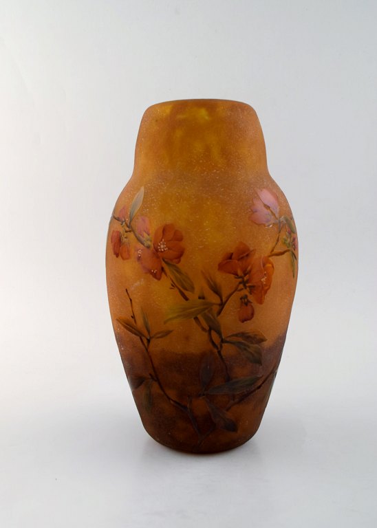 Large and impressive Daum Nancy art nouveau vase in mouth blown enamelled art 
glass. Acid-etched glass. Hand painted red flowers and branches in relief. Dated 
1915.