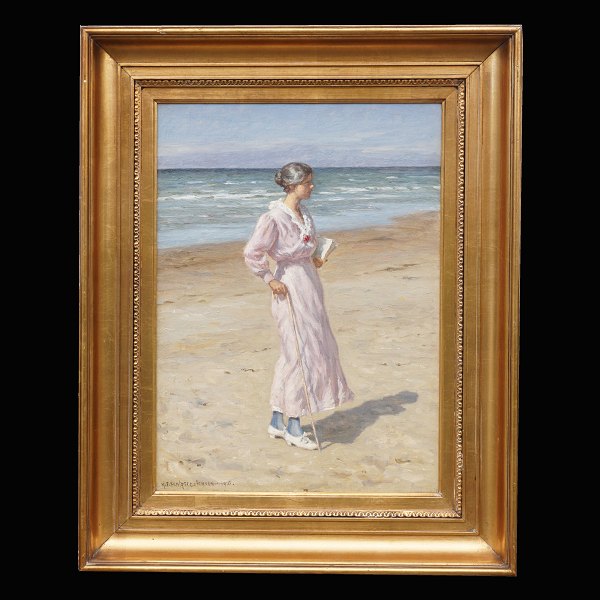 N. F. Schiøttz-Jensen, 1855-1941: Kvinde på Lønstrup strand. Olie på lærred. 
Signeret og dateret 1916. Lysmål: 48x34cm. Med ramme: 66x80cm