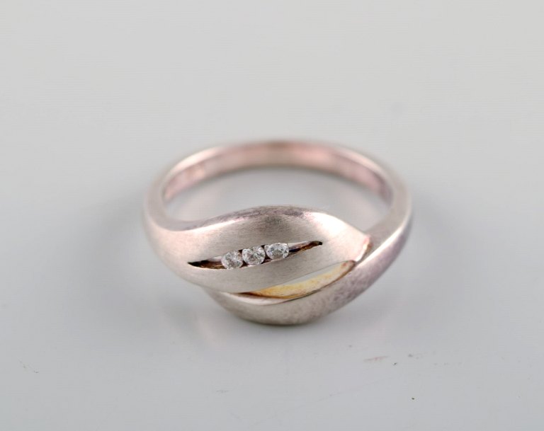 Swedish silversmith. Sterling silver ring adorned with three brilliants. 1970