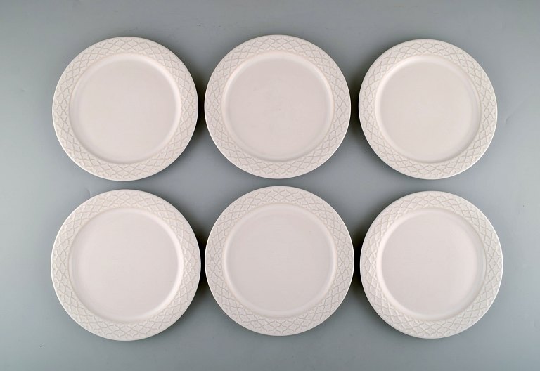 Jens H. Quistgaard for Bing & Grondahl. Six white "Cordial Palet" lunch plates 
in glazed stoneware. 1960