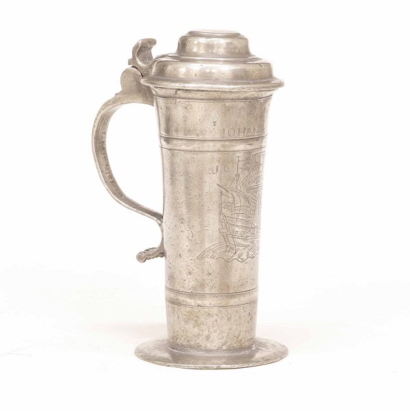 A 17th century Northgerman pewter cup dated 1657. Stamped. H: 23cm