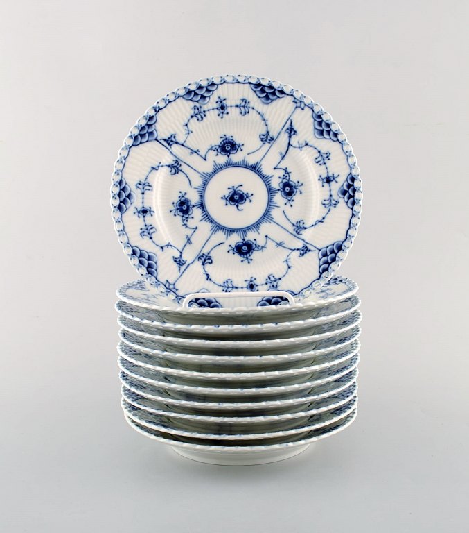 Royal Copenhagen porcelain dinnerware. Set of eleven Blue Fluted Full Lace 
plates no 1/1087.