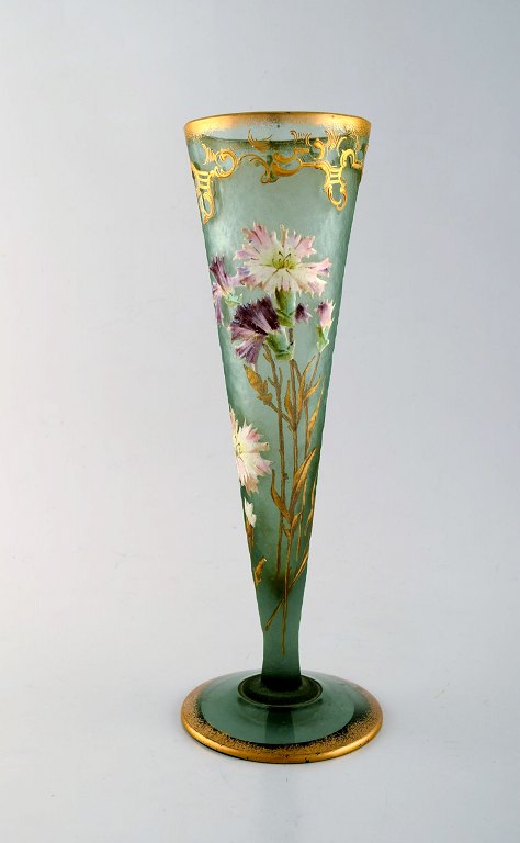 Montjoye, France. Large art nouveau vase in mouth-blown art glass. Decorated 
with flowers in enamel work, gilt. High quality vase. Dated 1880-1900.