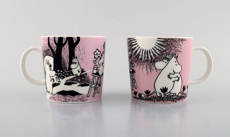 Arabia, Finland. Two cups in porcelain with motifs from "Moomin". Late 20th 
century.
