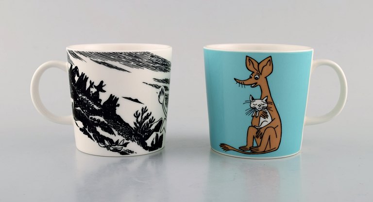 Arabia, Finland. Two cups in porcelain with motifs from "Moomin". Late 20th 
century.
