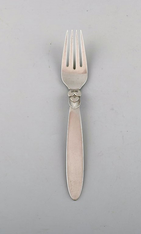 Early Georg Jensen "Cactus" dinner fork in sterling silver. Dated 1933-44. Two 
pieces in stock.
