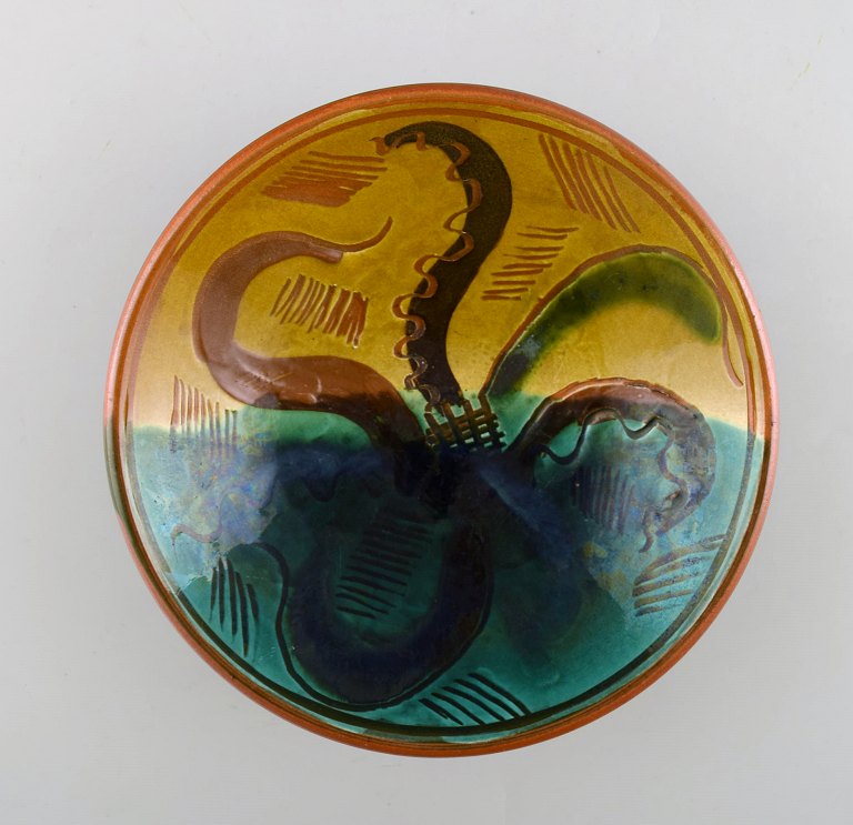 Wilhelm Kåge for Gustavsberg. Bowl in glazed ceramic with hand-painted octopus. 
1940