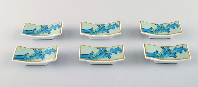 Gianni Versace for Rosenthal. Six "Arabesque" knife rests in porcelain. Late 
20th century.
