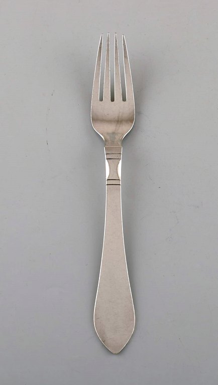 Georg Jensen Continental lunch fork in hammered sterling silver. Three pieces in 
stock. 
