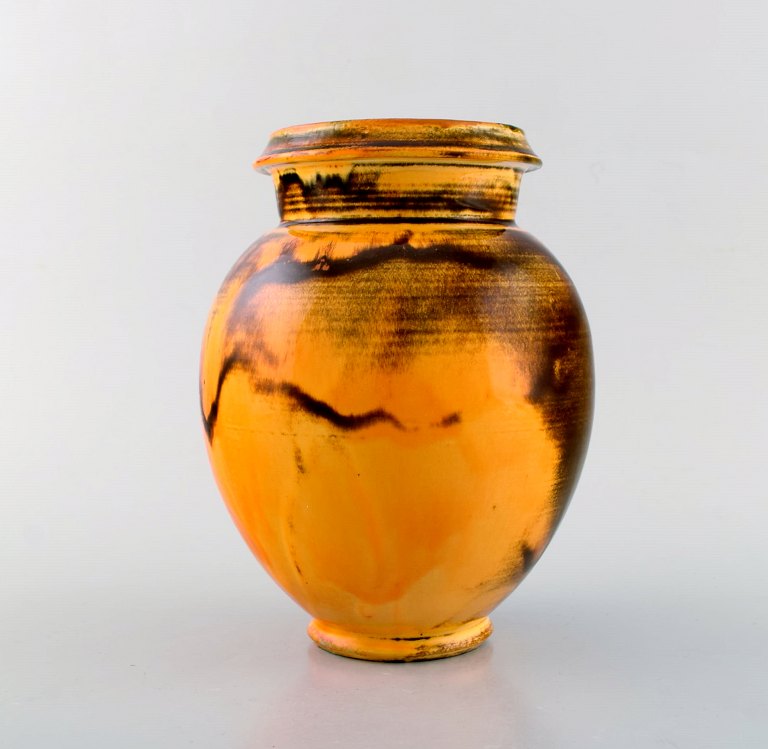 Svend Hammershøi for Kähler, Denmark. Vase in glazed stoneware. Beautiful yellow 
uranium glaze. 1930 / 40