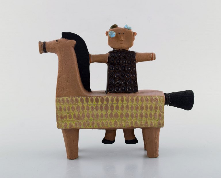 Rare Gustavsberg Studio hand, horse and man by Stig Lindberg, Swedish ceramist. 
Mid 20th century.
