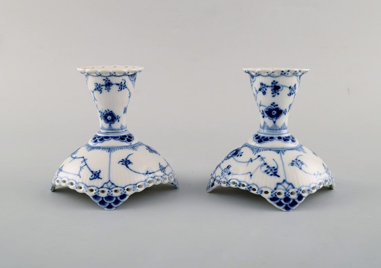 A pair of Royal Copenhagen Blue Fluted Full Lace candle holders in porcelain. 
Model Number 1/1138.
