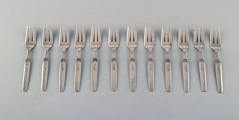 Hans Hansen silver cutlery number 16. Twelve art deco pastry forks in silver 
(830). Dated 1942.
