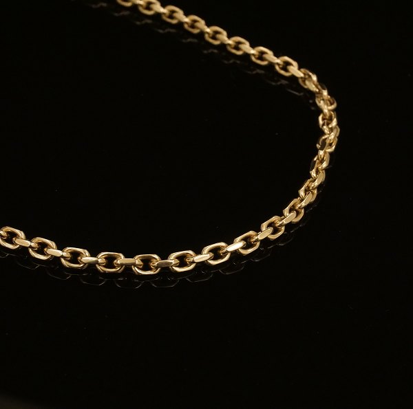 Jannik Lilleriis Andersen, Denmark: An 8kt gold anchor necklace. L: 52cm. W: 
34,1gr