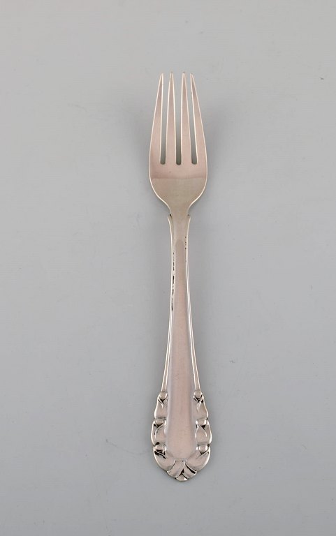 Georg Jensen "Lily of the Valley" lunch fork in sterling silver. Dated 1915-30.
