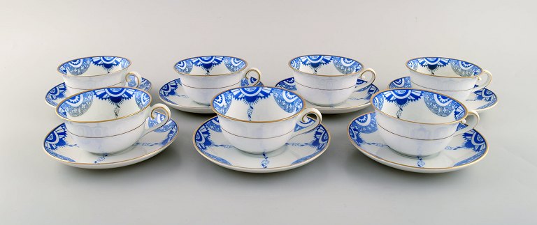 KPM, Berlin. Seven art deco teacups with saucers in hand-painted porcelain with 
gold decoration. 1930 / 40