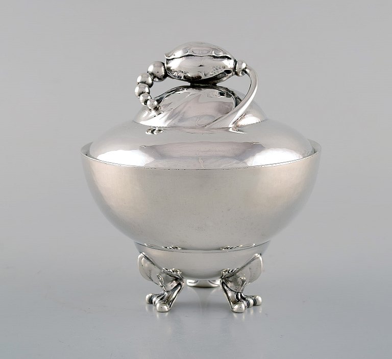 Early Georg jensen Magnolia sugar bowl on feet in sterling silver. Model number 
2D. 1920