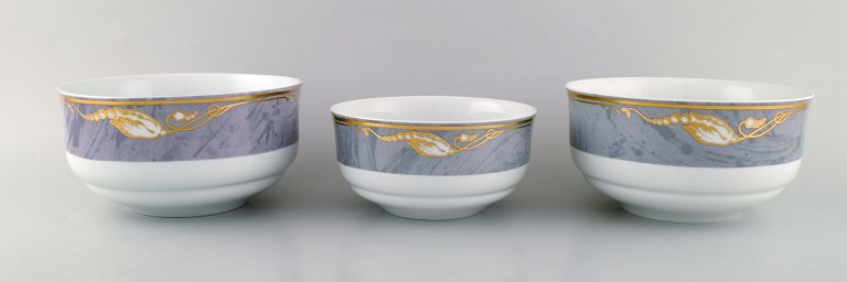 Three Royal Copenhagen Gray Magnolia salad bowls in porcelain. Late 20th 
century.
