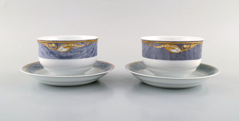 Two Royal Copenhagen Gray Magnolia sauce boats in porcelain. Model number 575. 
Late 20th century.
