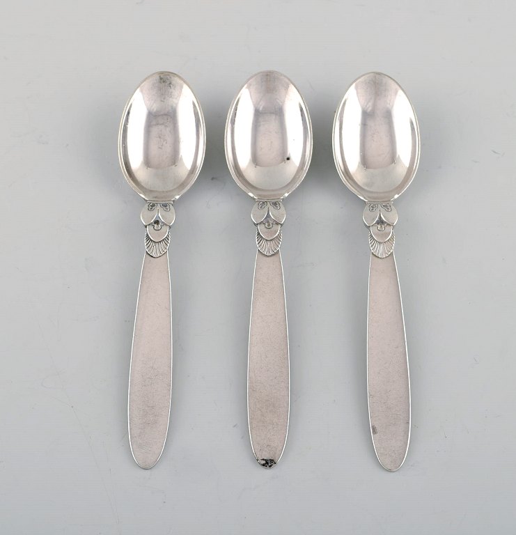 Three Georg Jensen Cactus coffee spoons in sterling silver.
