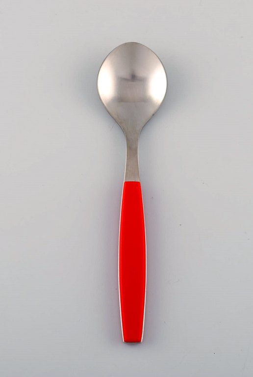 Henning Koppel for Georg Jensen. Strata sorbet spoon in stainless steel and red 
plastic. Seven pcs in stock.
