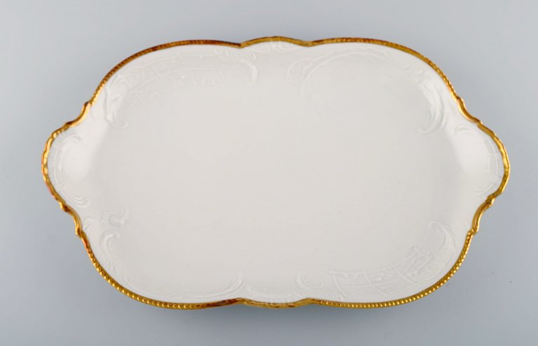 Large Rosenthal Sans Souci serving dish in porcelain with flowers and foliage in 
relief and gold edge. 20th century.
