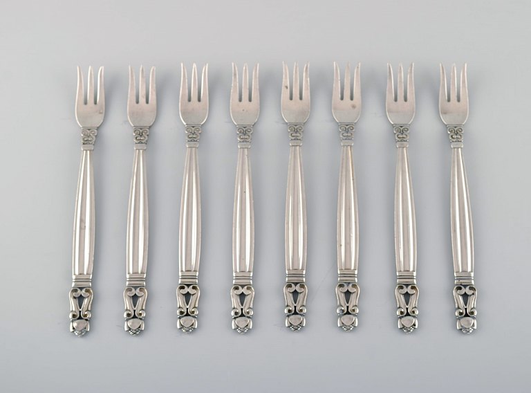 Eight Georg Jensen Acorn oyster forks in sterling silver.
