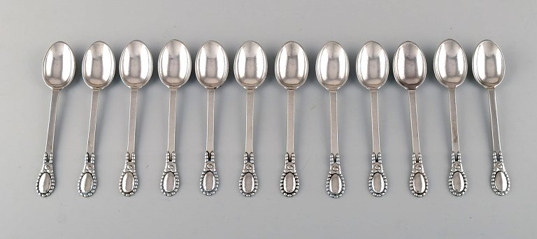Evald Nielsen number 13. Twelve large teaspoons in hammered silver (830). 1920s.
