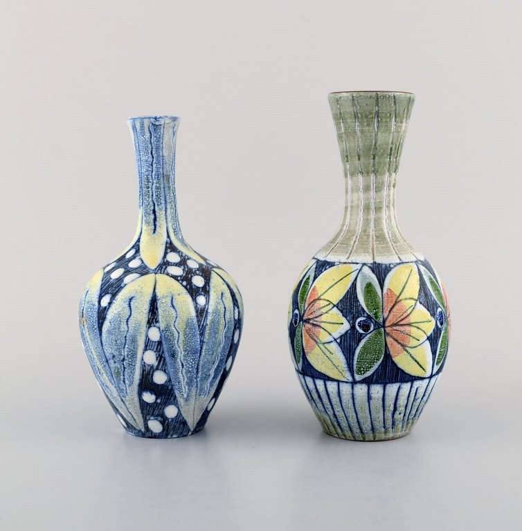 Tilgmans, Sweden. Two vases in glazed ceramics with hand painted  flowers. 
1960s.
