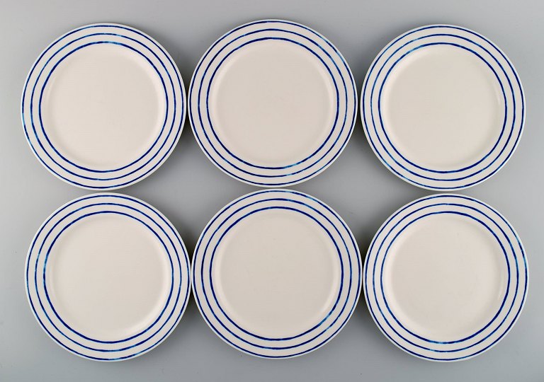 Jackie Lynd for Duka. Six plates in glazed stoneware with blue striped 
decoration. Swedish design, early 21st century.
