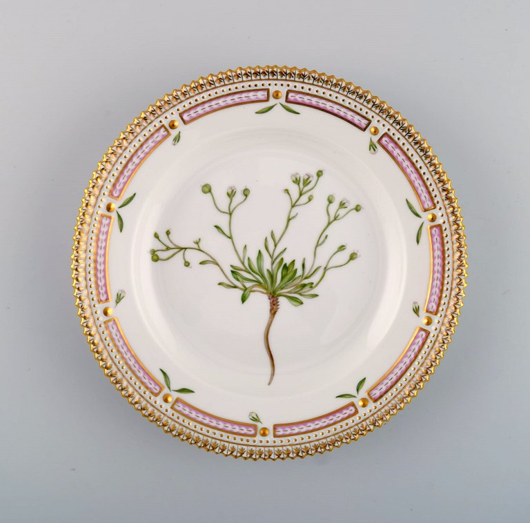 Royal Copenhagen Flora Danica salad plate in hand-painted porcelain with flowers 
and gold decoration. Model number 20/3573.
