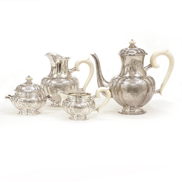 A Danish sterlingsilver coffee service by Axel Salomonsen, Copenhagen, circa 
1935-40. H: 22,5cm. W: 1.861gr