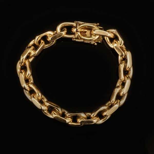 A 14kt gold anchor bracelet by Bjarne Nordmark Henriksen, Copenhagen. L: 20,5cm. 
W: 83,9gr